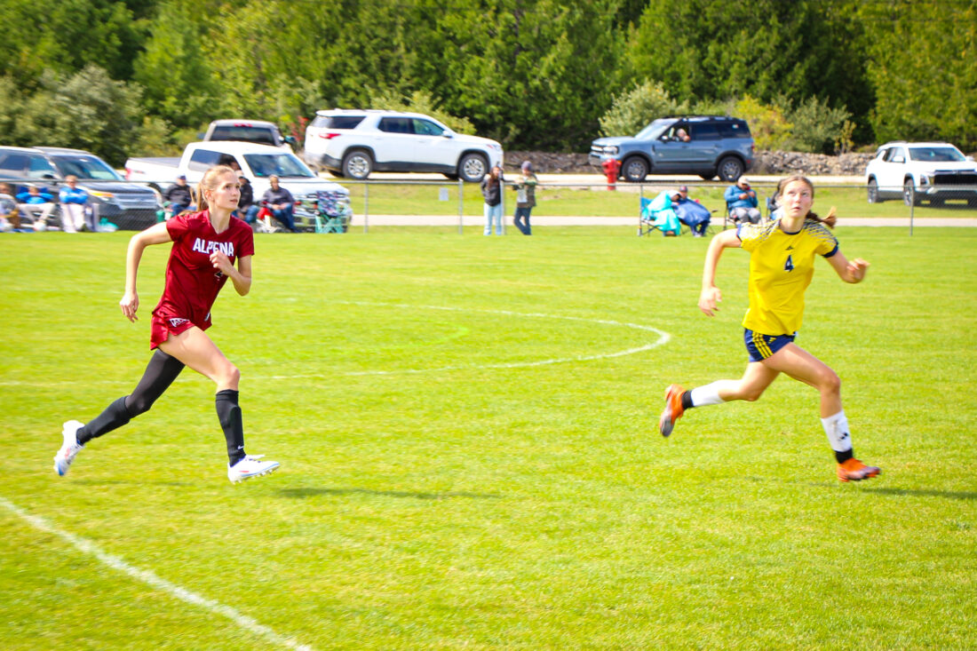 ACC's Haley Glick runs down the field